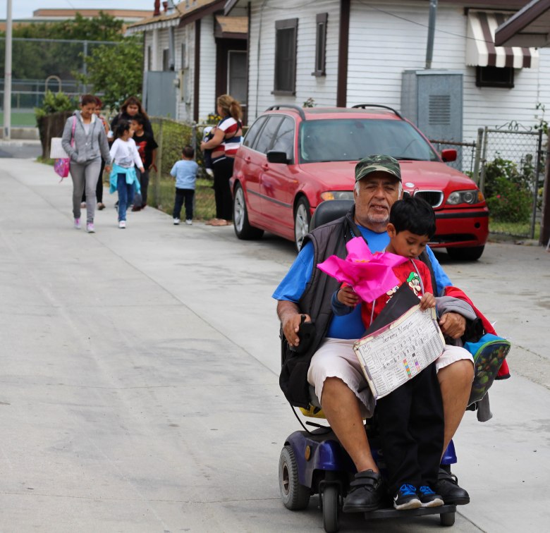 Picking up his grandson Jeremy, who he babysits daily with his wife.